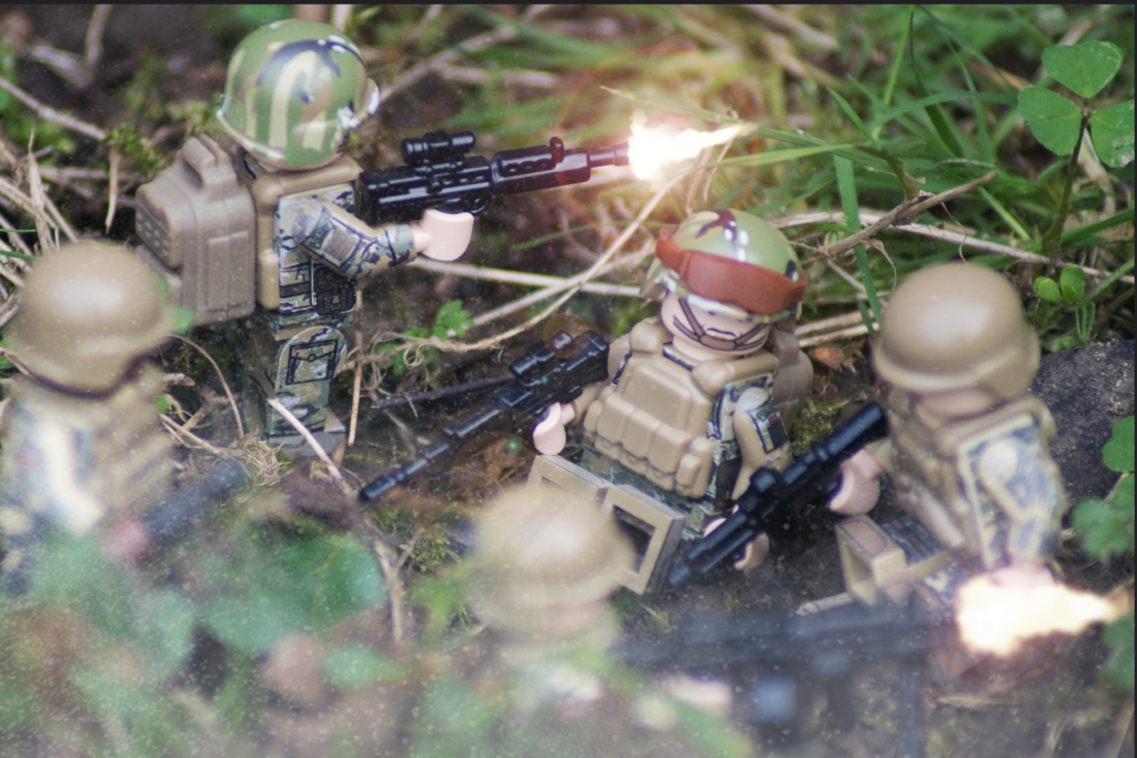 LEGO Body Armour - Image of British and American Soldier LEGO Minifigures using BrickArms weapons, with SI-Dan equipment thrown in.